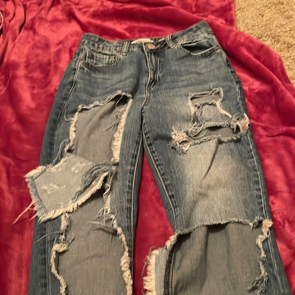 extremely distressed jeans